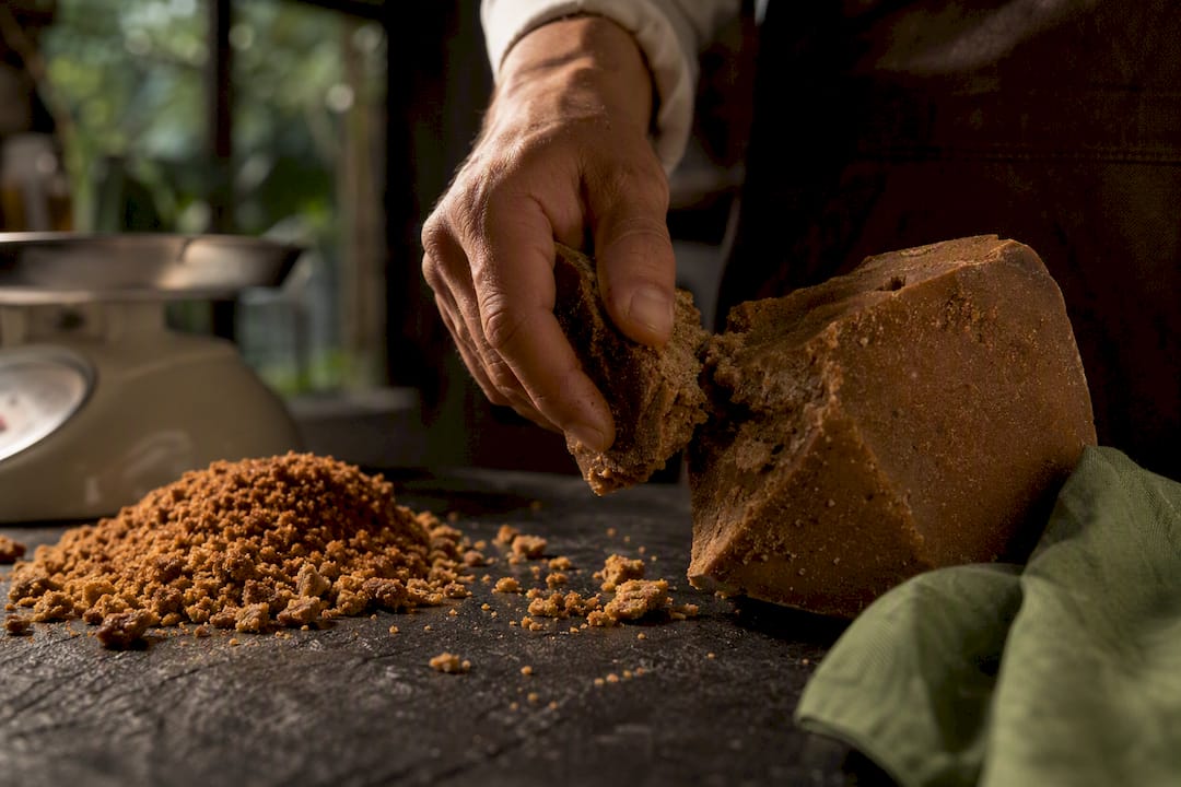 Broken panela and scale on stone